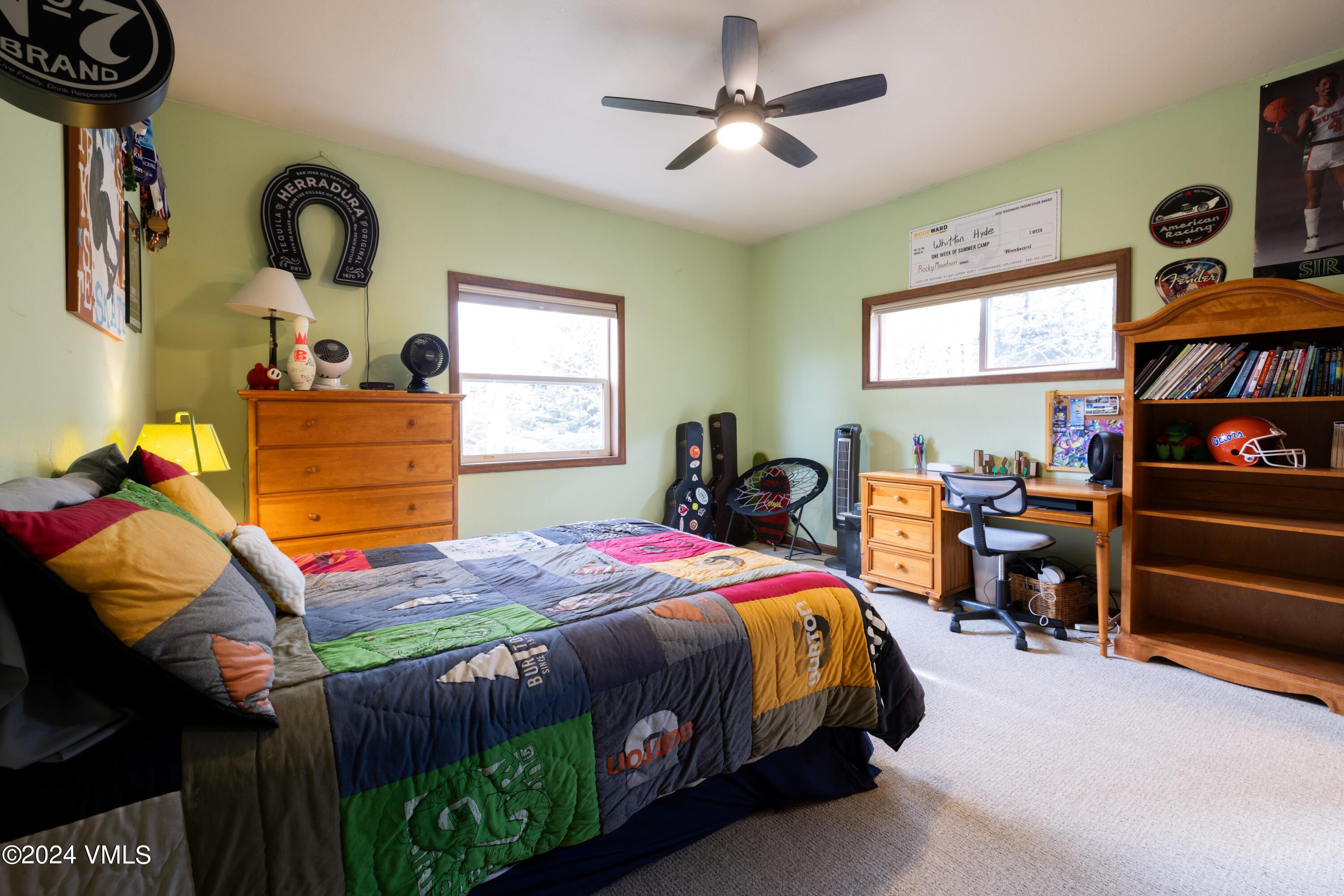 46 Andover Trail, Unit A Edwards, CO 81632 - Photo 16 of 27 a bedroom with a bed and dresser