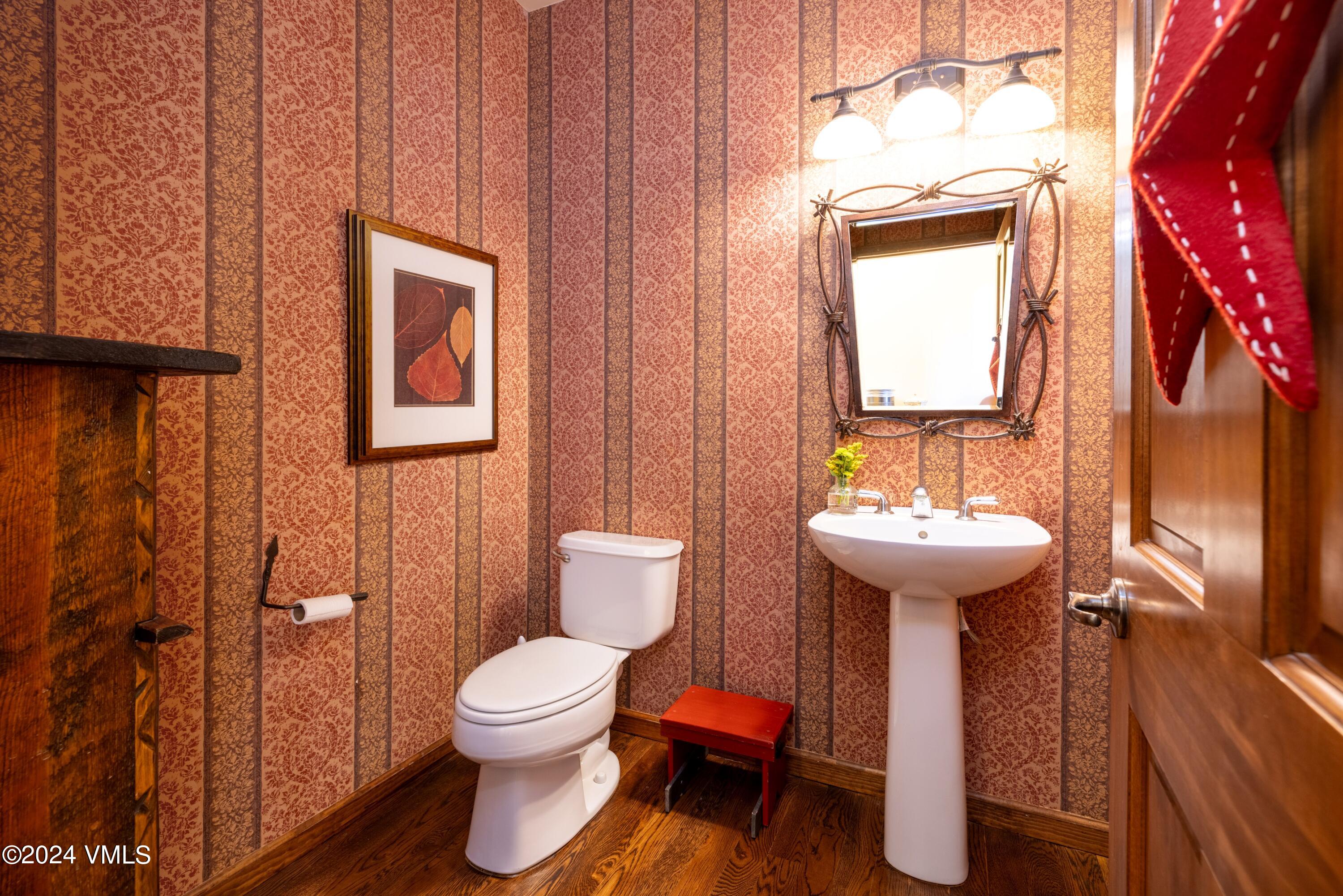 46 Andover Trail, Unit A Edwards, CO 81632 - Photo 18 of 27 a bathroom with a toilet sink and mirror