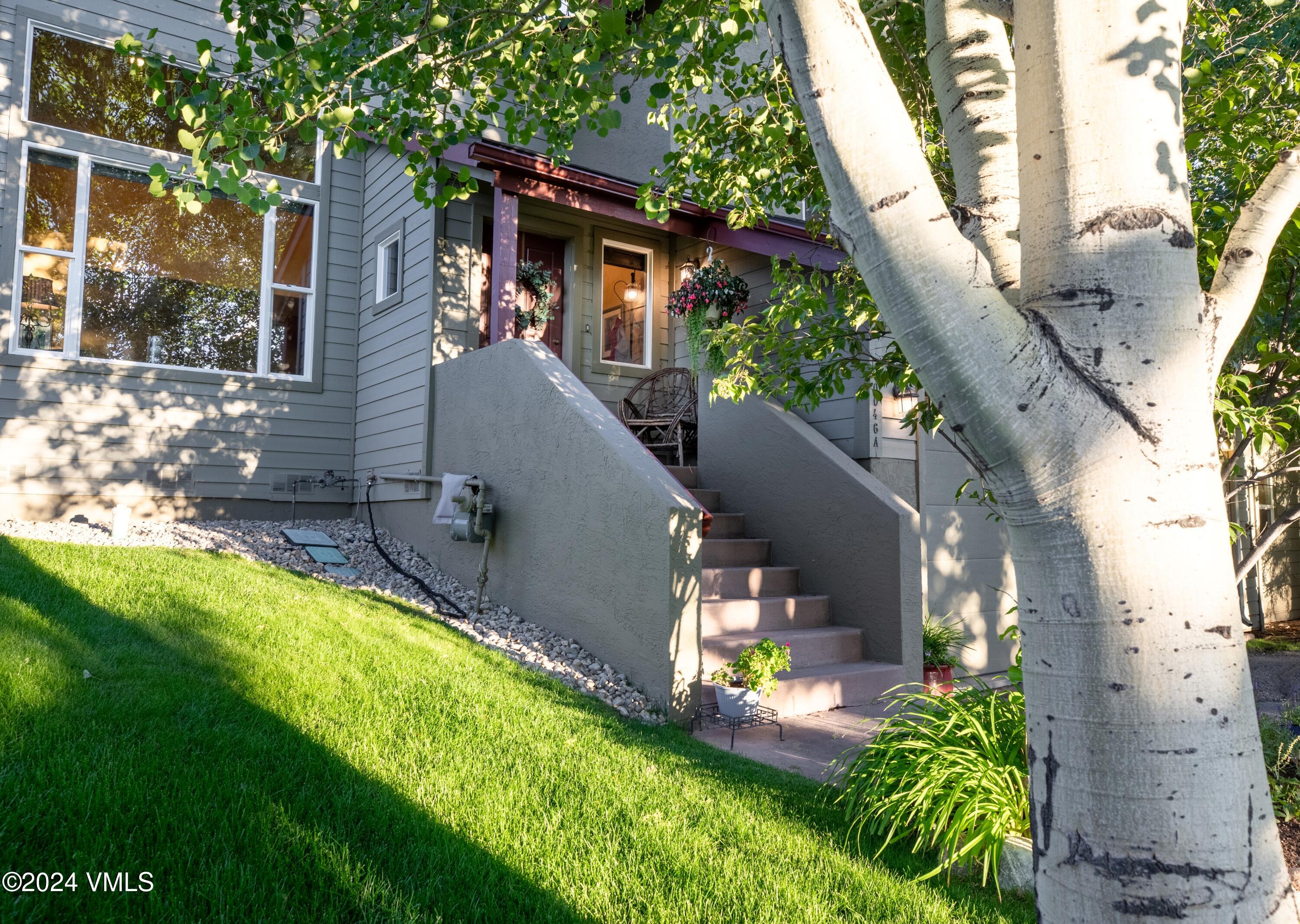 46 Andover Trail, Unit A Edwards, CO 81632 - Photo 20 of 27 a view of a house with a yard