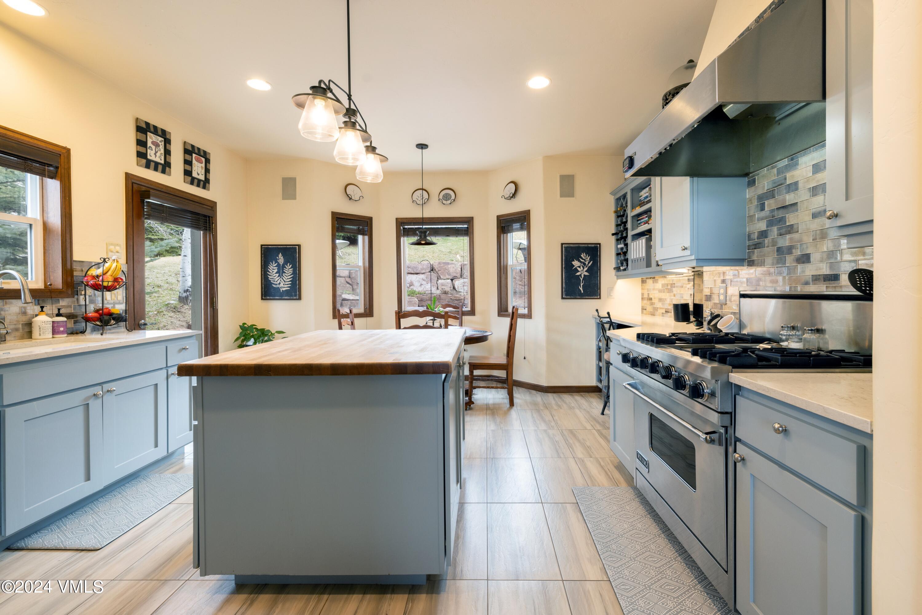 46 Andover Trail, Unit A Edwards, CO 81632 - Photo 4 of 27 a kitchen with stainless steel appliances a sink stove and refrigerator