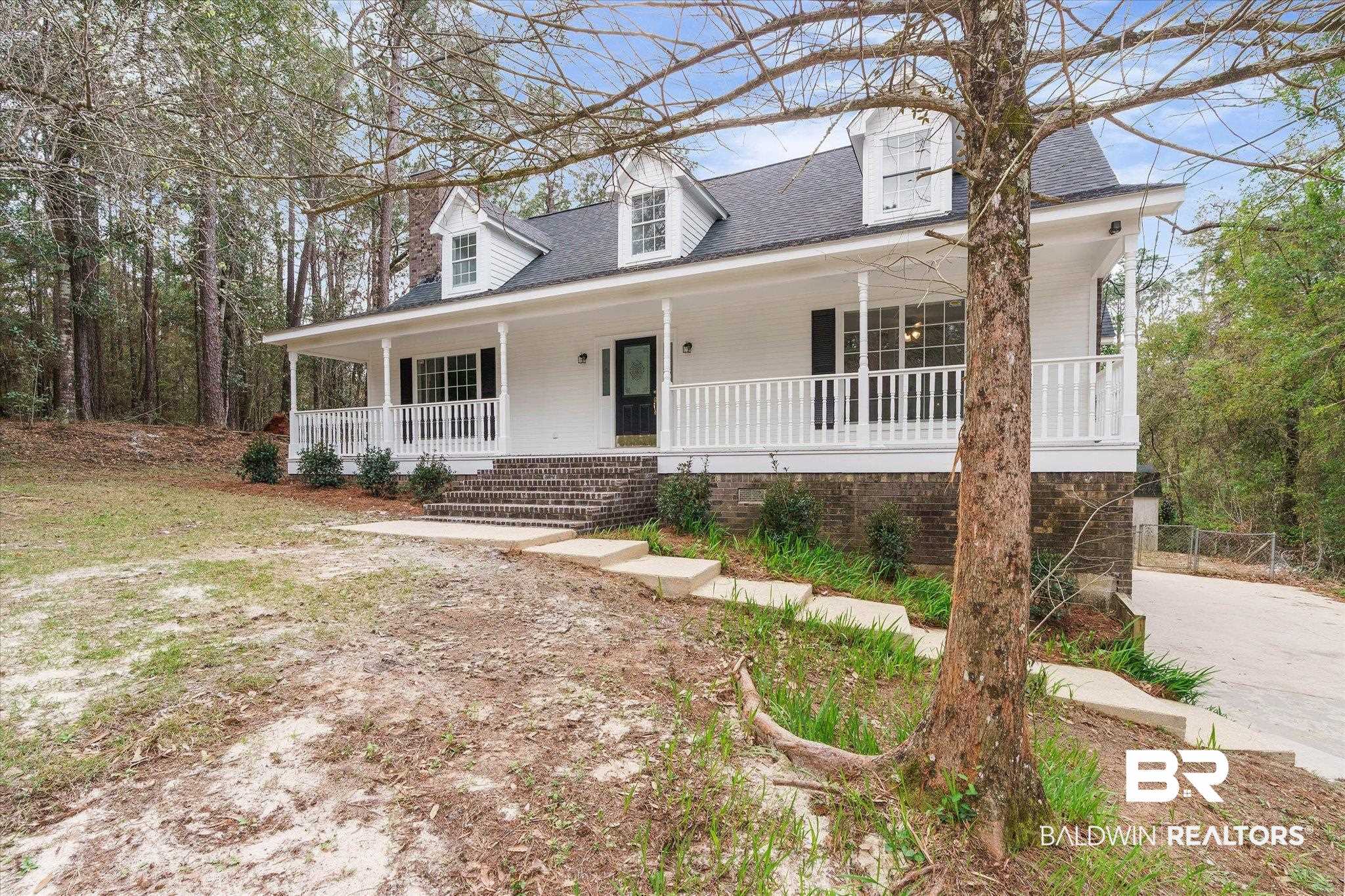 106 Melanie Loop Daphne, AL 36526 - Photo 40 of 45 New england style home featuring covered porch and a shingled roof