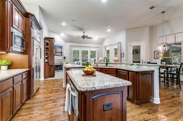 a kitchen with granite countertop lots of counter top space