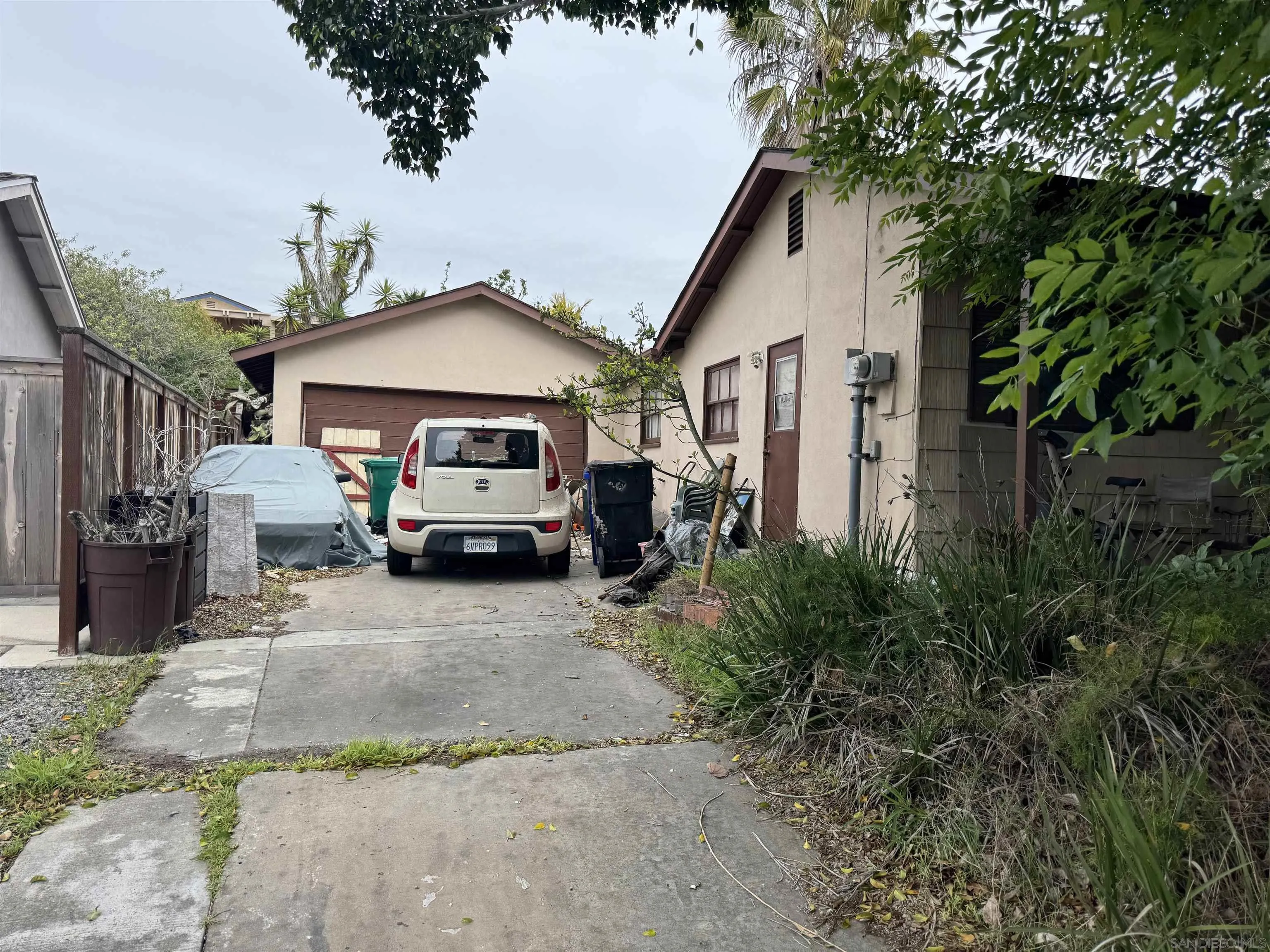 4239 Moraga Avenue San Diego, CA 92117 - Photo 1 of 1 a car parked in front of house