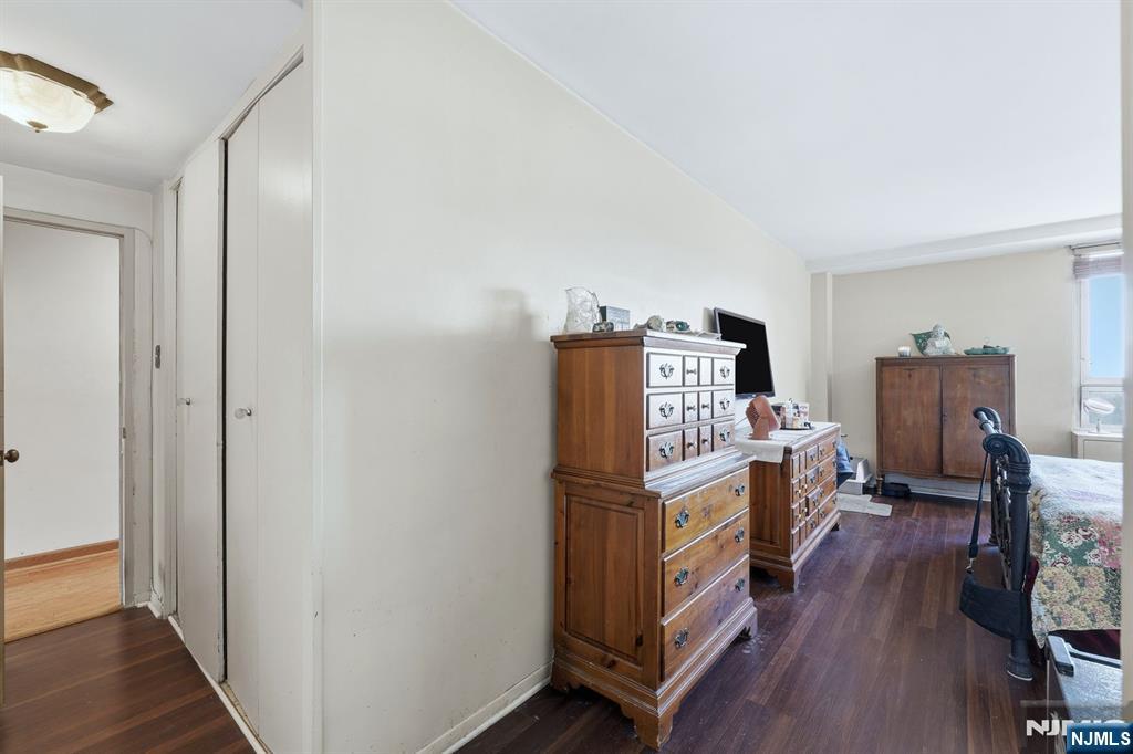 2 Horizon Road, Unit 1010 Fort Lee, NJ 07024 - Photo 22 of 42 a kitchen with stainless steel appliances a refrigerator and a stove