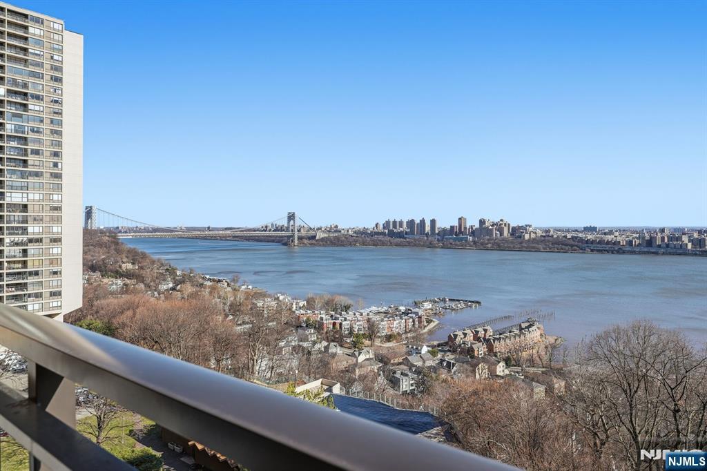 2 Horizon Road, Unit 1010 Fort Lee, NJ 07024 - Photo 25 of 42 a view of a lake from a balcony