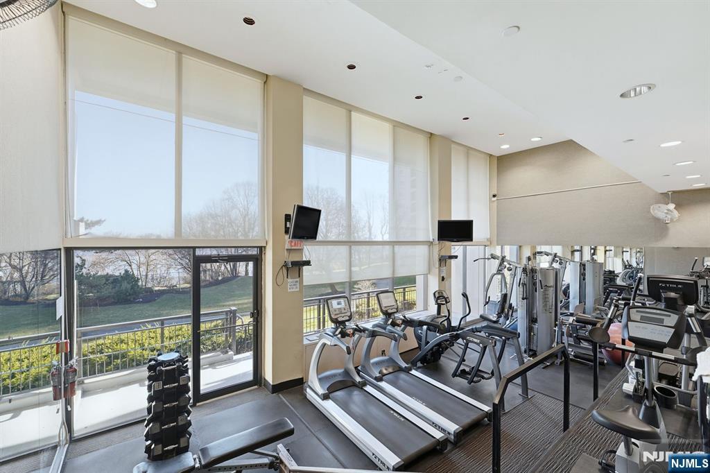 2 Horizon Road, Unit 1010 Fort Lee, NJ 07024 - Photo 28 of 42 a view of a room with gym equipment