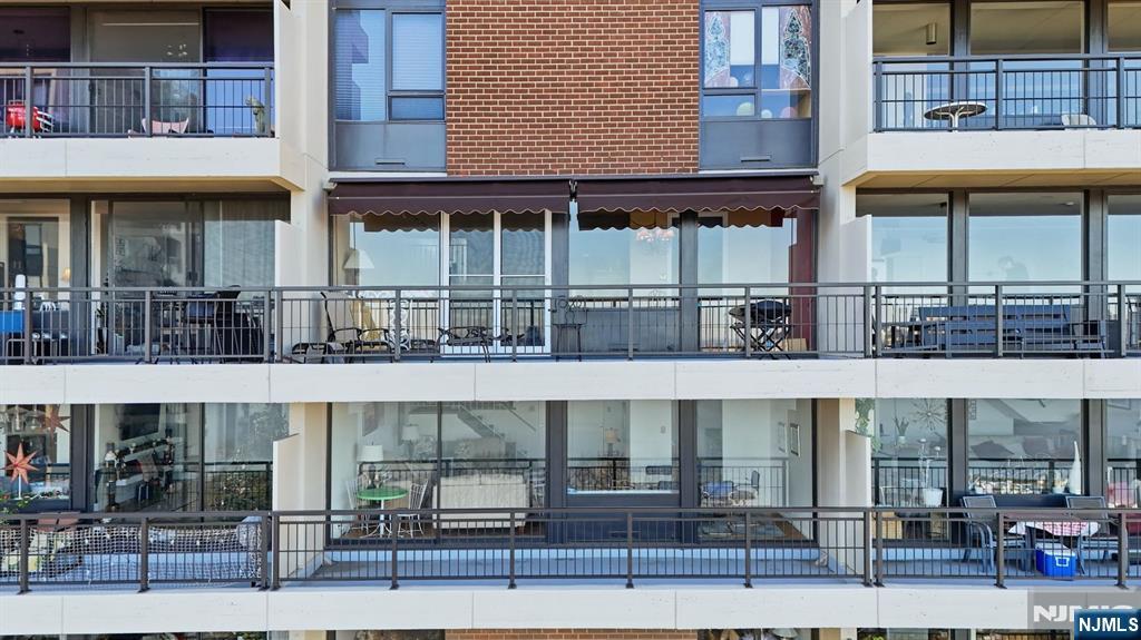 2 Horizon Road, Unit 1010 Fort Lee, NJ 07024 - Photo 3 of 42 a view of a building with a window
