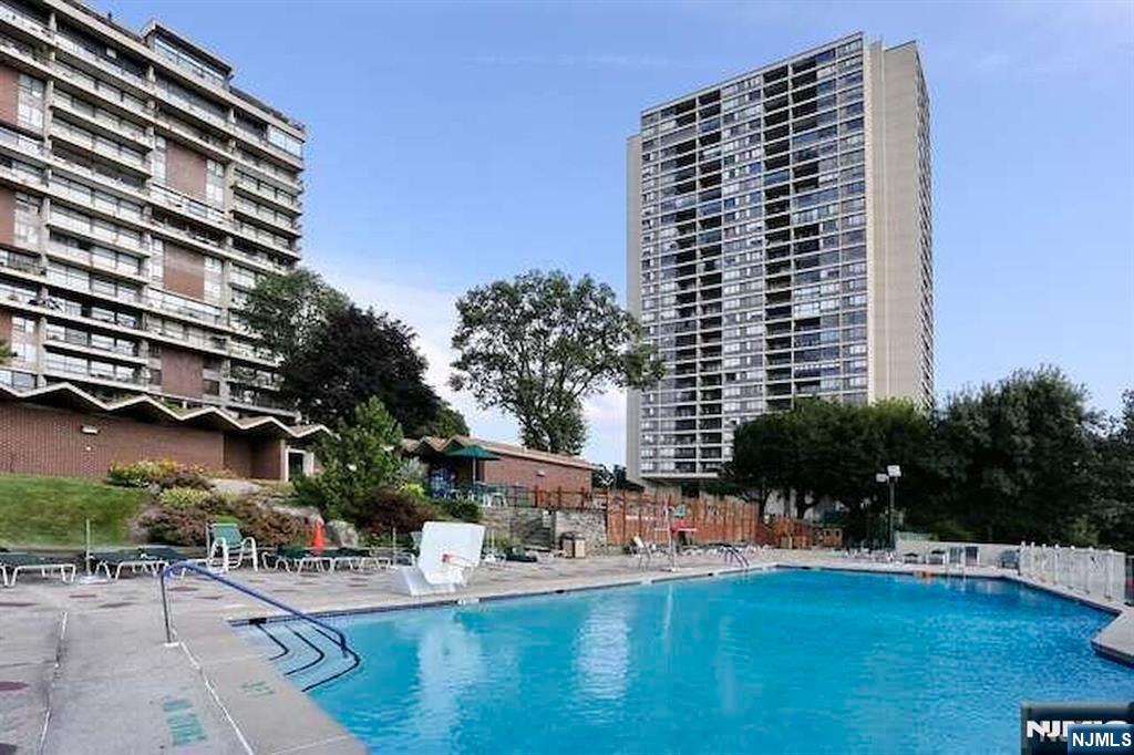 2 Horizon Road, Unit 1010 Fort Lee, NJ 07024 - Photo 31 of 42 a view of building with outdoor space and swimming pool