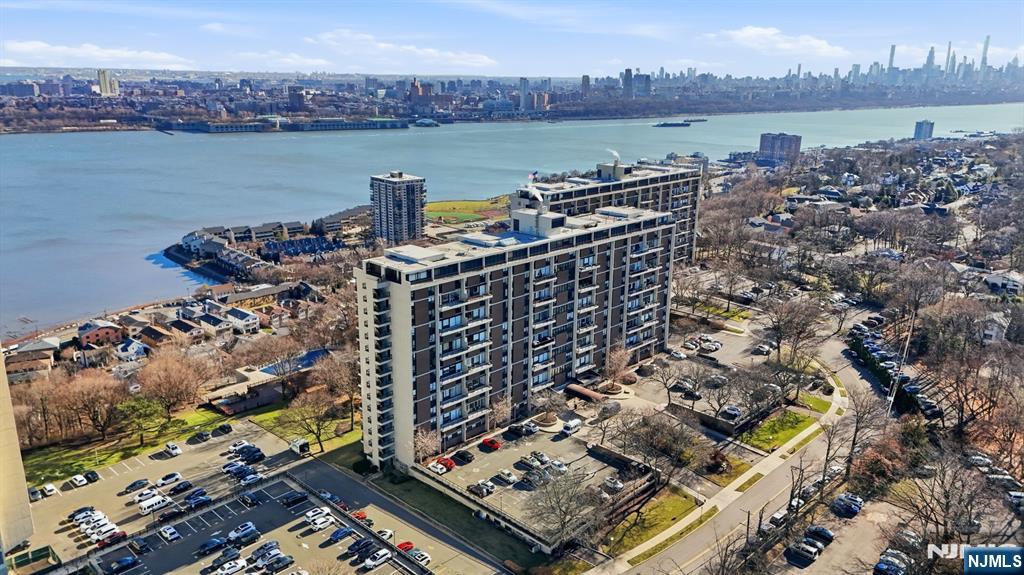 2 Horizon Road, Unit 1010 Fort Lee, NJ 07024 - Photo 33 of 42 a view of a city and a lake