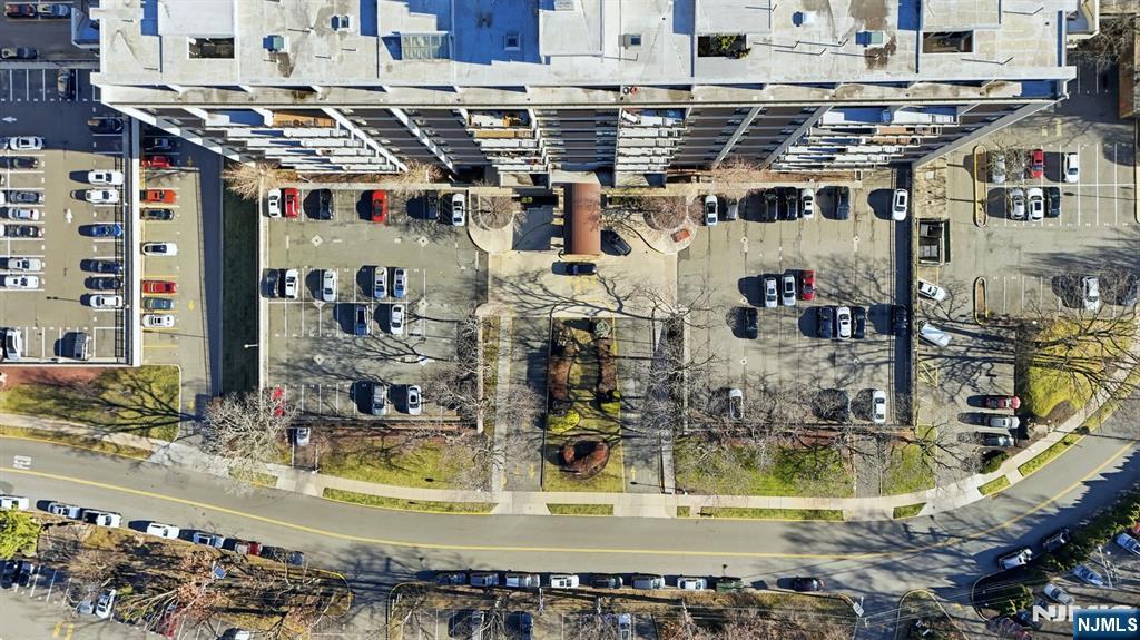 2 Horizon Road, Unit 1010 Fort Lee, NJ 07024 - Photo 37 of 42 a view of water pool with an outdoor seating