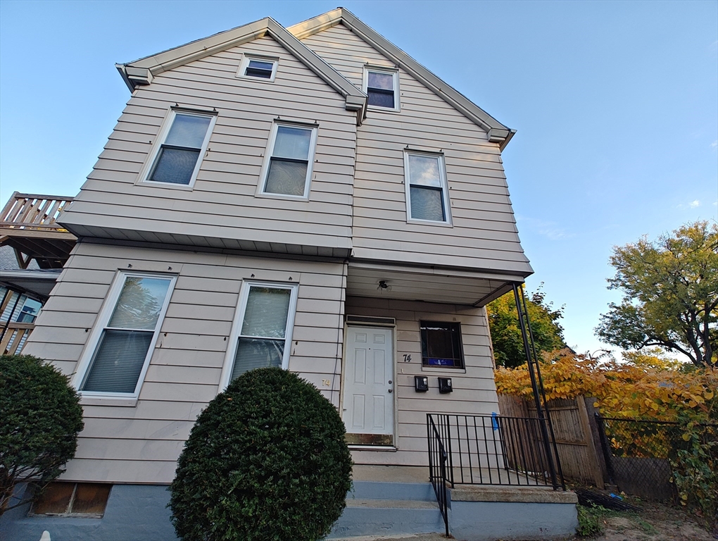 74 Linden Street, Unit 2 Holyoke, MA 01040 - Photo 20 of 20 a front view of a house with a yard