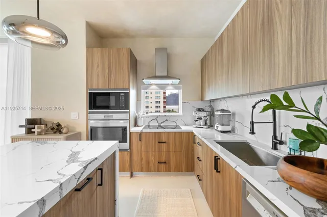 a kitchen with a sink stove top oven and cabinets