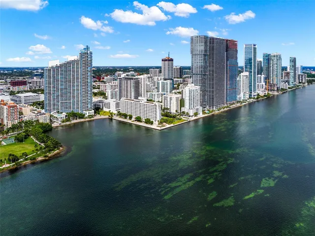 a view of a city with tall buildings