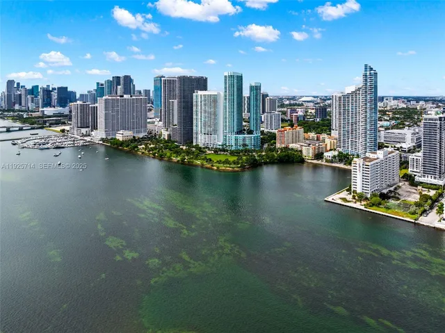 a view of a city with tall buildings