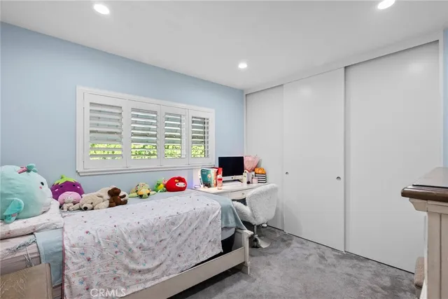 a bed room with a bed and a bed