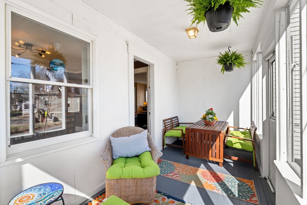 2 Brooks Street Maynard, MA 01754 - Photo 25 of 42 a living room with furniture and a potted plant