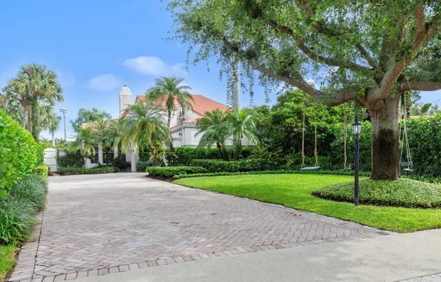 a house with a bench in front of it
