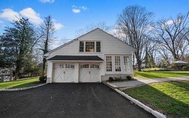 453 West Saddle River Road Upper Saddle River, NJ 07458 - Photo 26 of 28 a view of a house with a yard