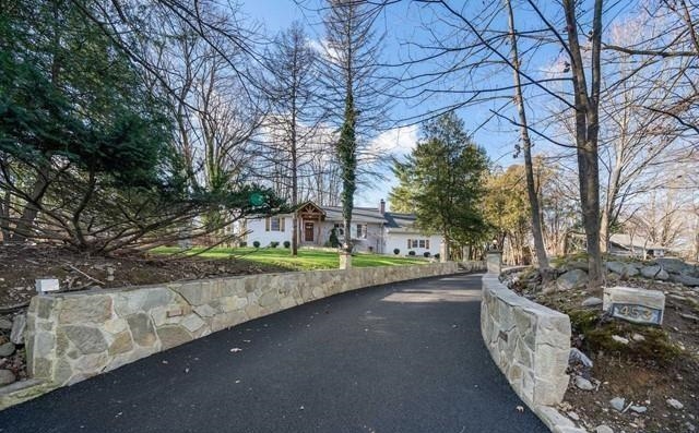 453 West Saddle River Road Upper Saddle River, NJ 07458 - Photo 27 of 28 a view of a street with large trees