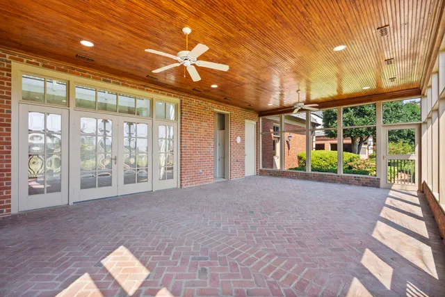 a view of an empty room with a large window