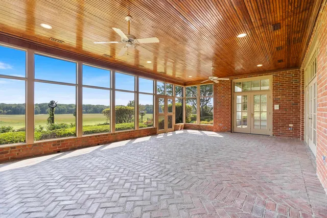 a view of kitchen and wooden floor