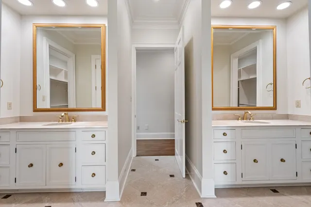 a view of an empty room with a cabinet