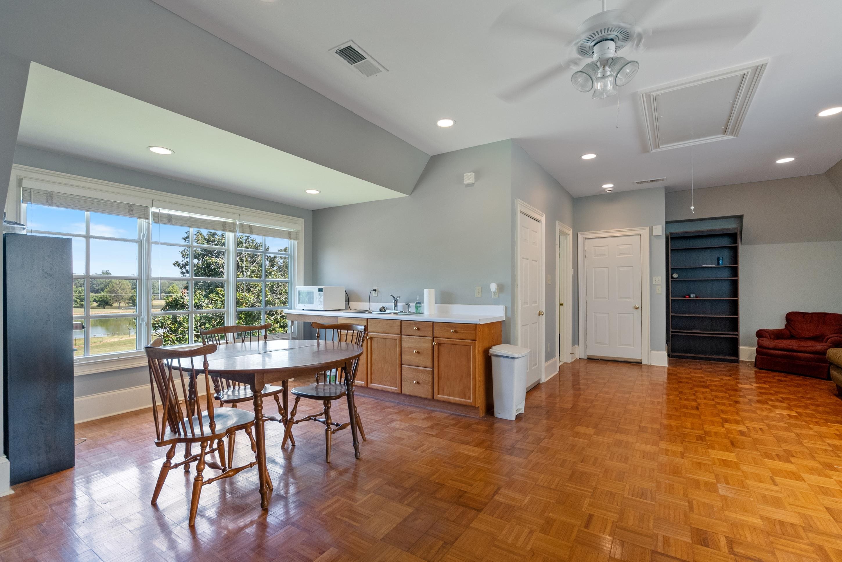 1800 North Collierville Arlington Road Eads, TN 38028 - Photo 33 of 40 a kitchen with a table and chairs in it