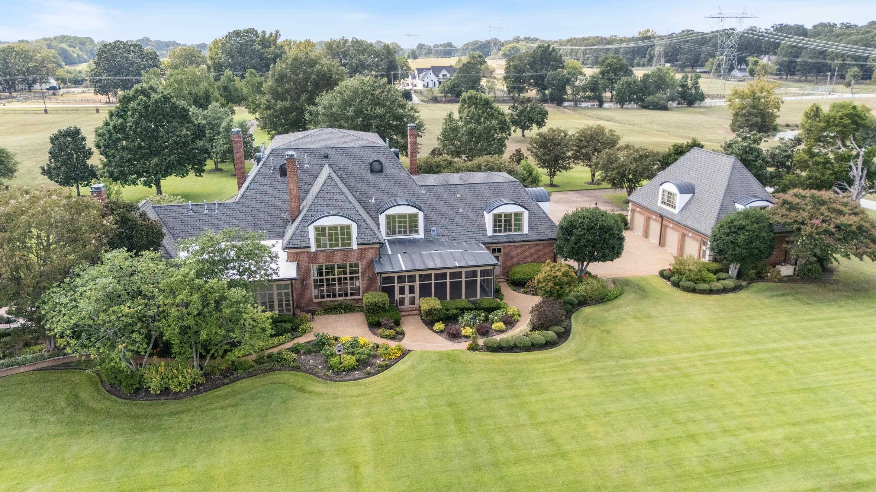 1800 North Collierville Arlington Road Eads, TN 38028 - Photo 39 of 40 an aerial view of a house with garden space and lake view