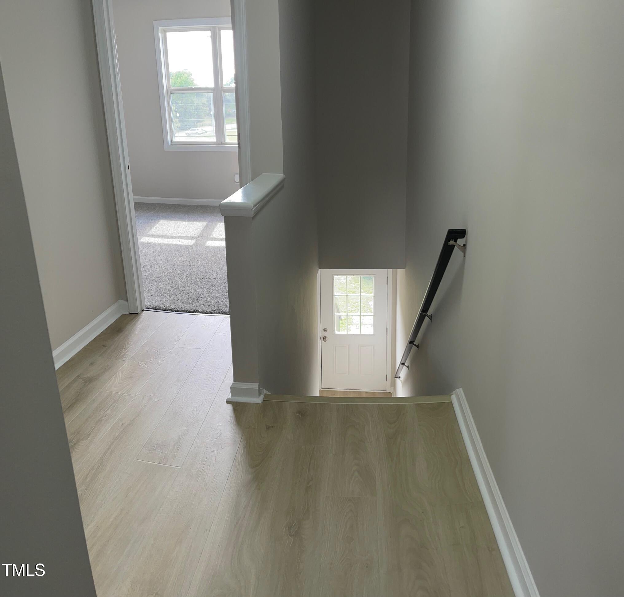 351 East Williams Street Angier, NC 27501 - Photo 12 of 24 a view of an empty room and window
