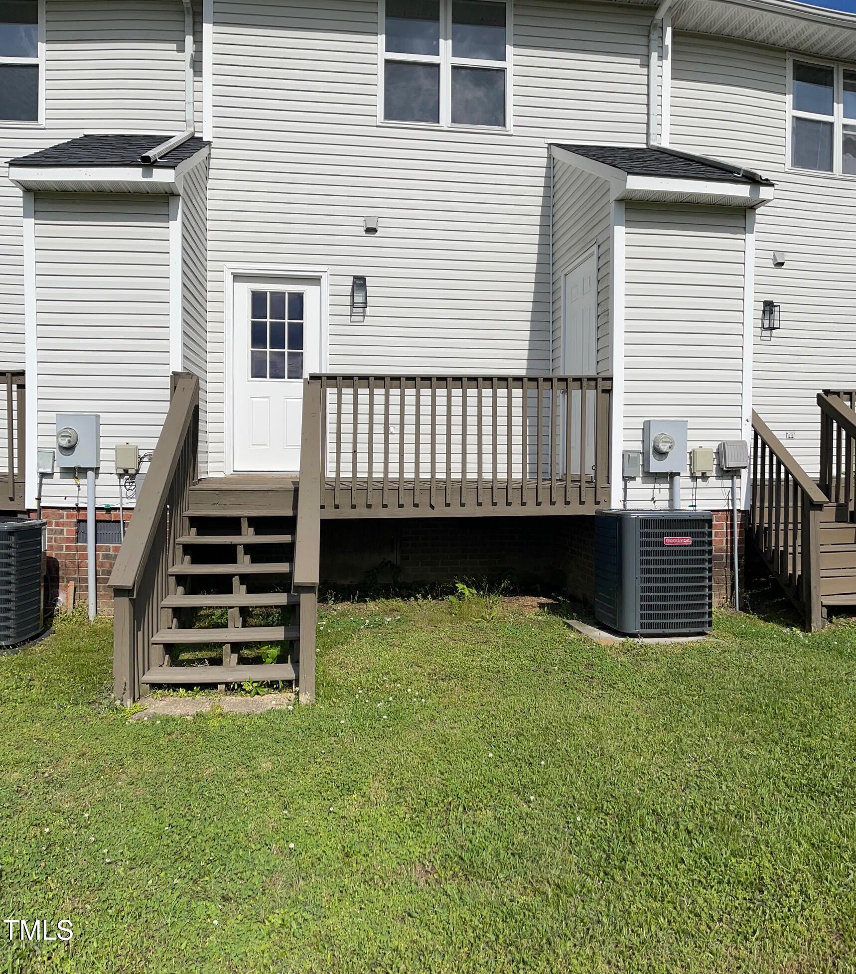 351 East Williams Street Angier, NC 27501 - Photo 2 of 24 a view of a backyard with a deck