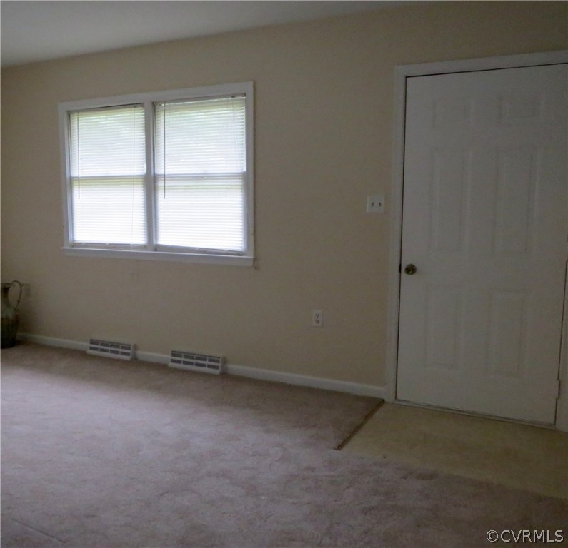 833 Old Ridge Road Farmville, VA 23901 - Photo 3 of 14 an empty room with a window