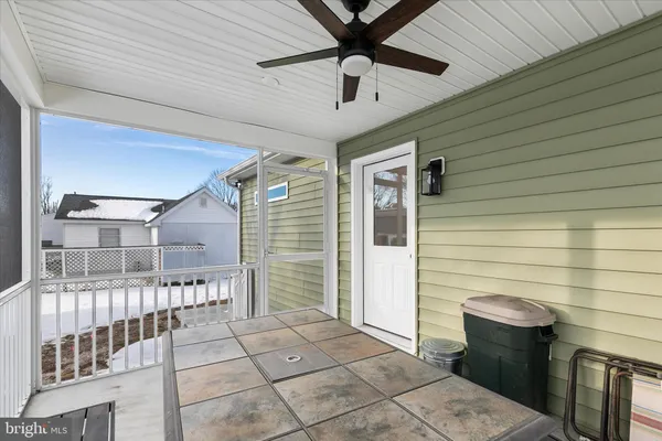 a porch with seating space