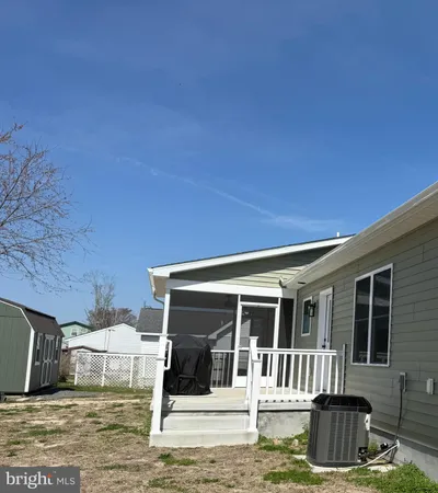 a front view of a house with a porch