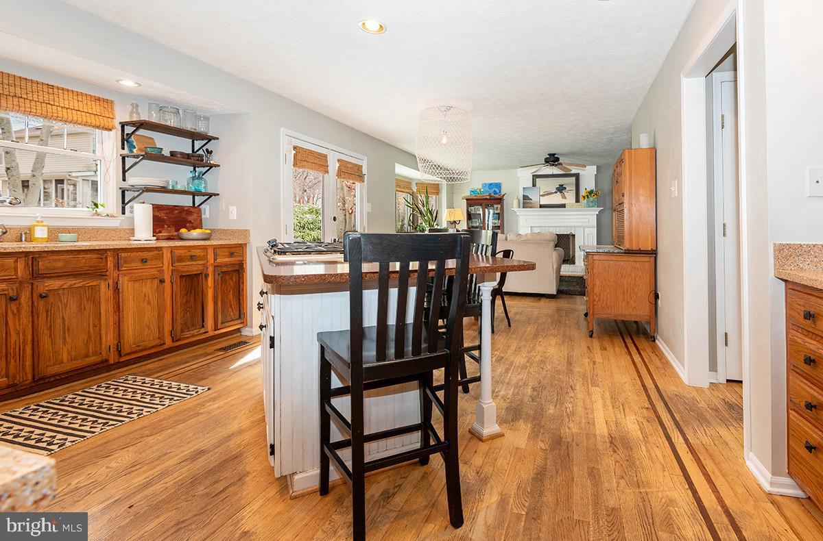 1665 Patrice Circle Crofton, MD 21114 - Photo 12 of 55 a view of a dining room with furniture window and wooden floor