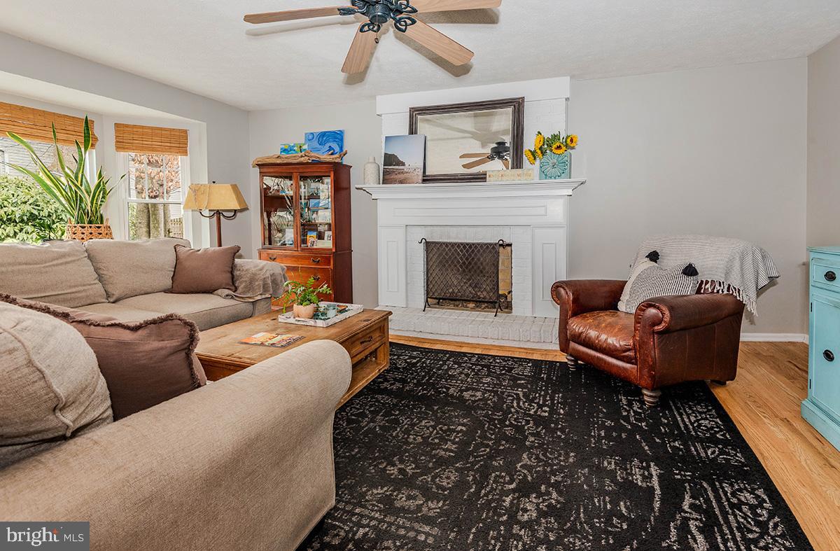 1665 Patrice Circle Crofton, MD 21114 - Photo 15 of 55 a living room with furniture and a fireplace