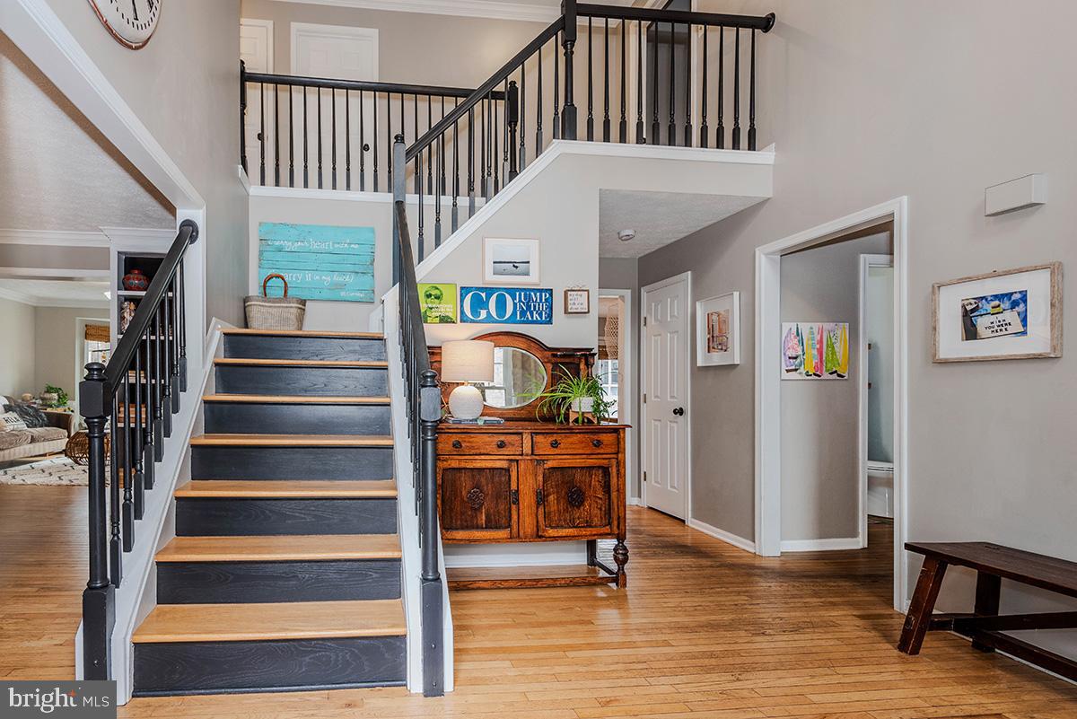1665 Patrice Circle Crofton, MD 21114 - Photo 2 of 55 a view of entryway livingroom and hall with wooden floor