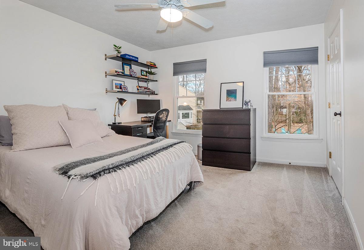 1665 Patrice Circle Crofton, MD 21114 - Photo 29 of 55 a bedroom with a bed and a window