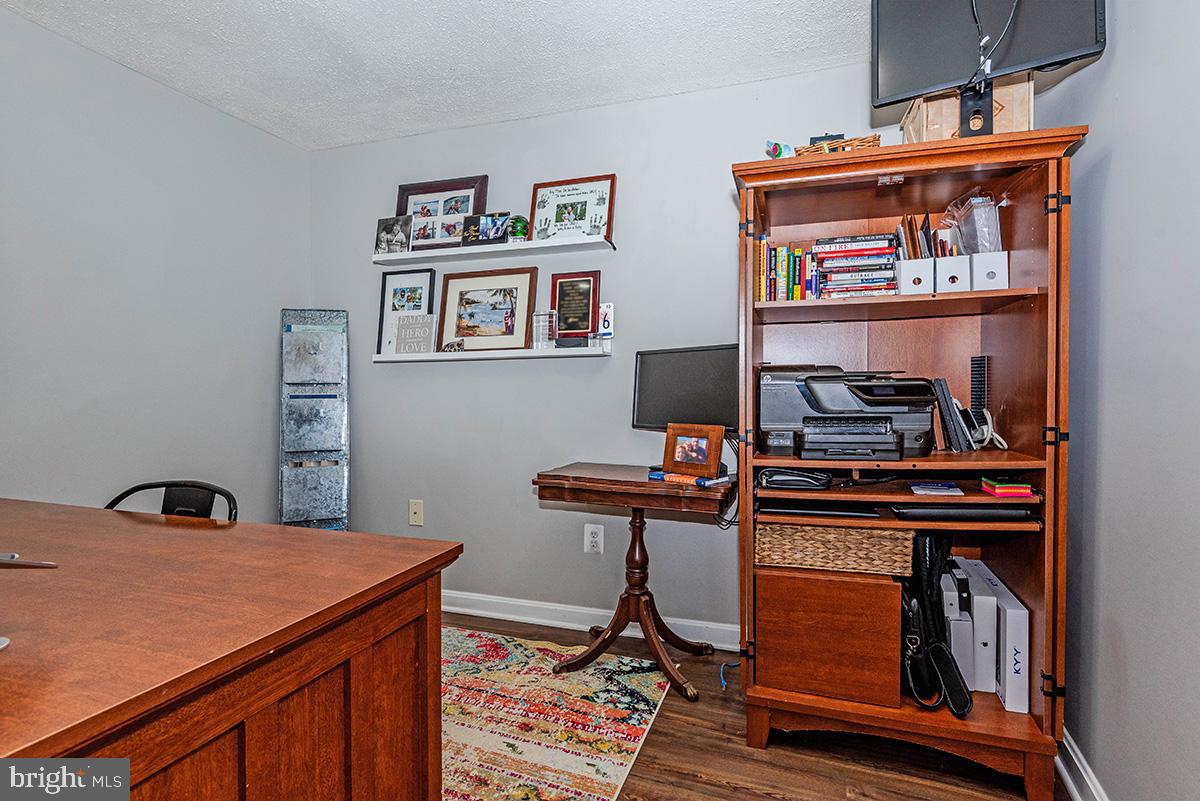 1665 Patrice Circle Crofton, MD 21114 - Photo 41 of 55 a room with furniture and wooden floor