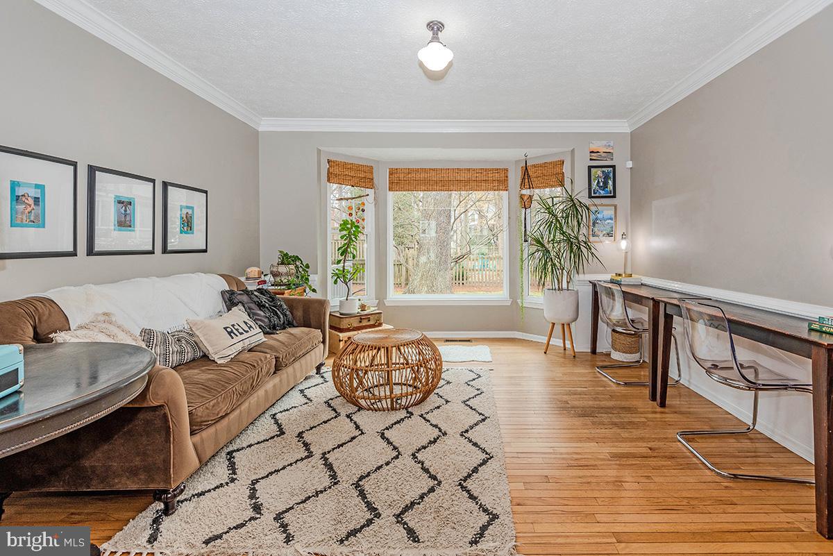 1665 Patrice Circle Crofton, MD 21114 - Photo 7 of 55 a living room with furniture and a large window