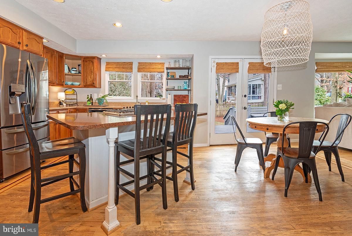 1665 Patrice Circle Crofton, MD 21114 - Photo 10 of 55 a view of a dining room with furniture and a large window