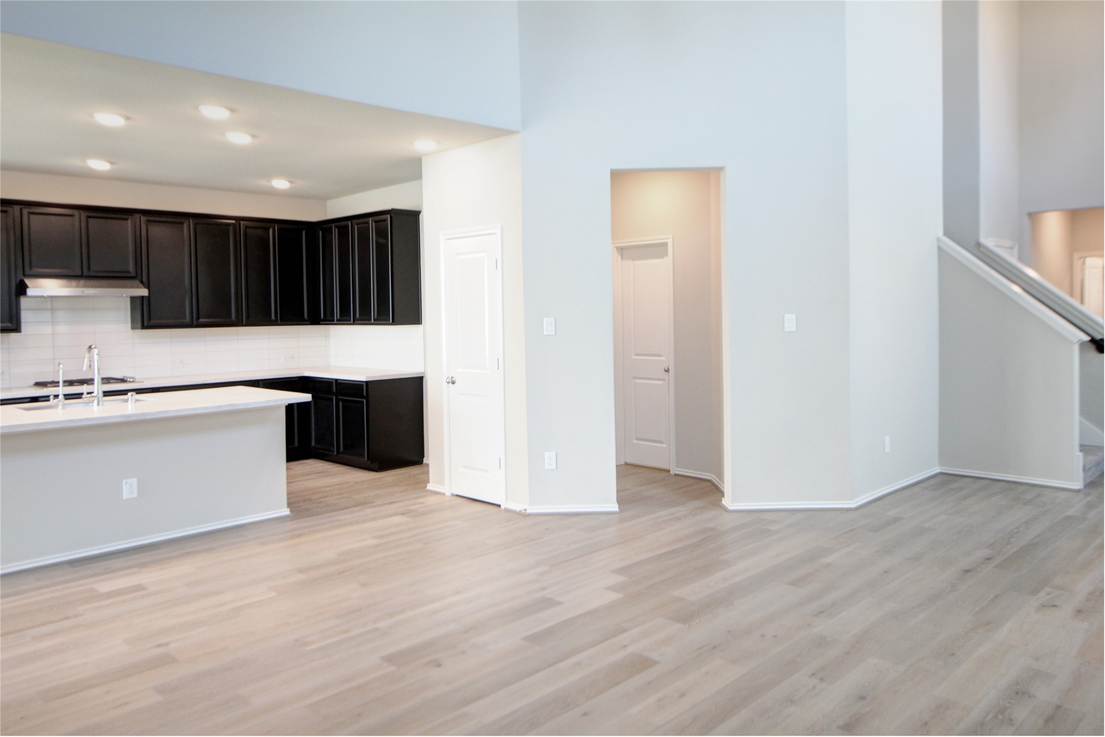 523 Timber Voyage Court Conroe, TX 77304 - Photo 4 of 20 a view of kitchen with wooden floor