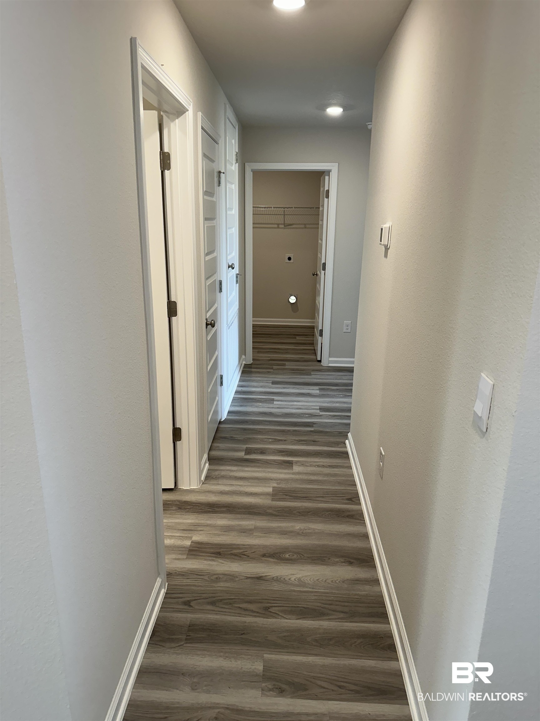 22044 Aleutian Avenue Foley, AL 36535 - Photo 10 of 28 Hall with dark wood-type flooring