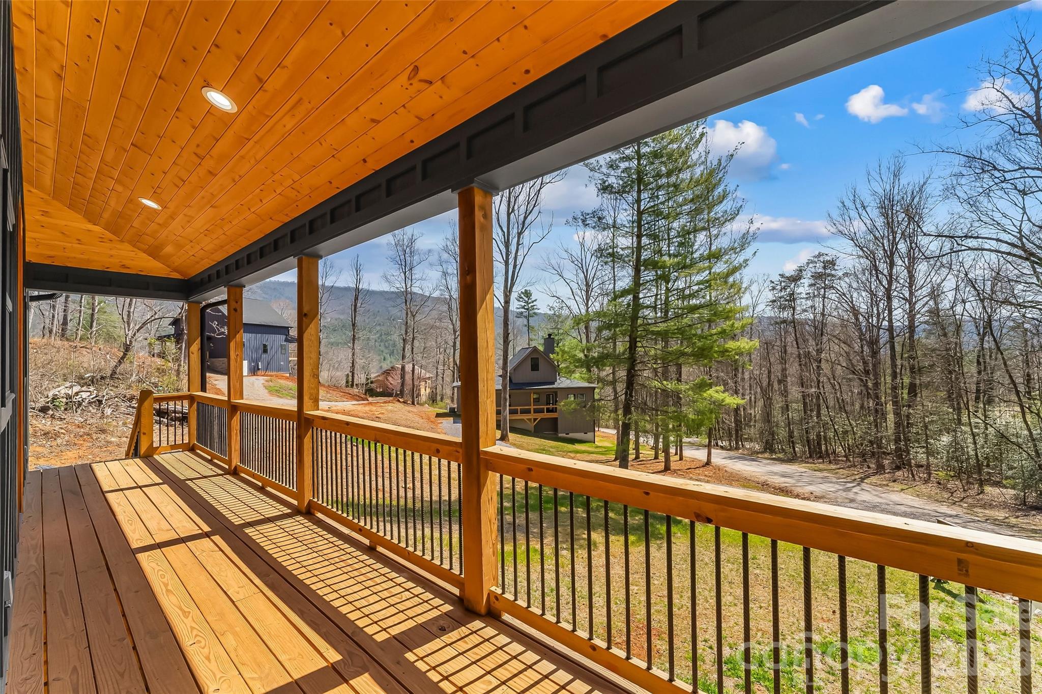 189 Clinchfield Gap Road Marion, NC 28752 - Photo 5 of 42 a view of balcony with wooden floor