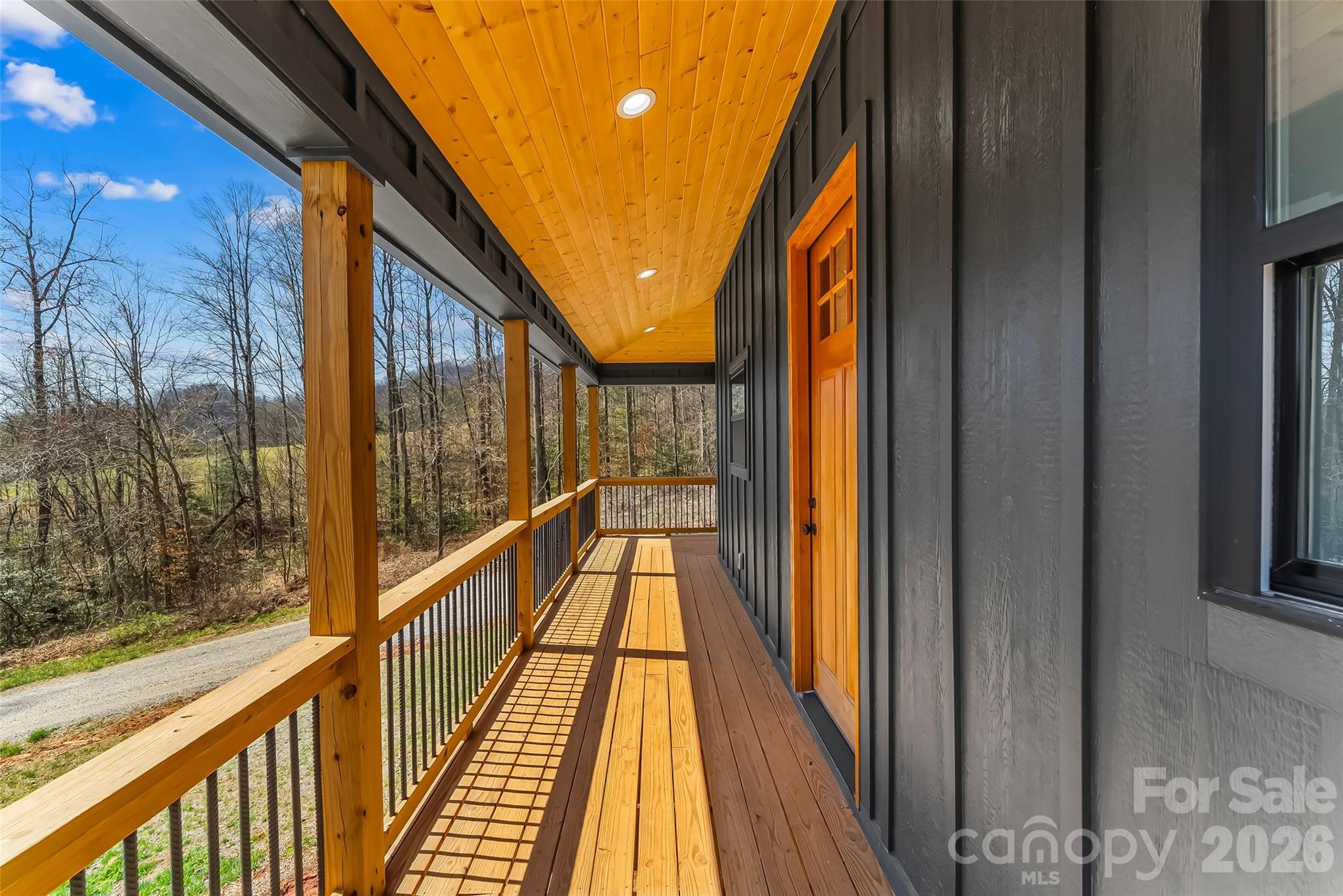 189 Clinchfield Gap Road Marion, NC 28752 - Photo 7 of 42 a view of balcony with wooden floor