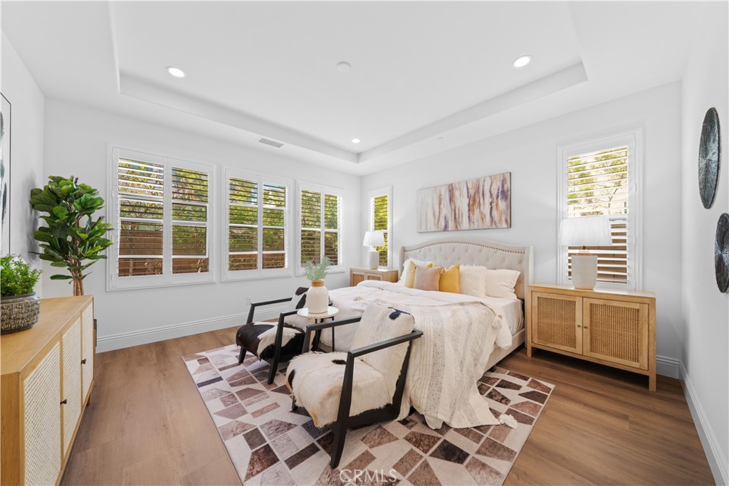 18 Windrow Road Tustin, CA 92782 - Photo 11 of 35 a bed room with furniture and a window