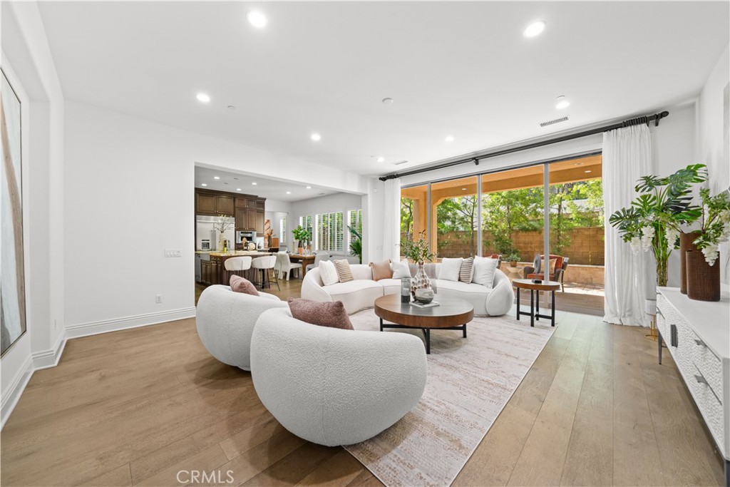 18 Windrow Road Tustin, CA 92782 - Photo 4 of 35 a living room with furniture and a large window