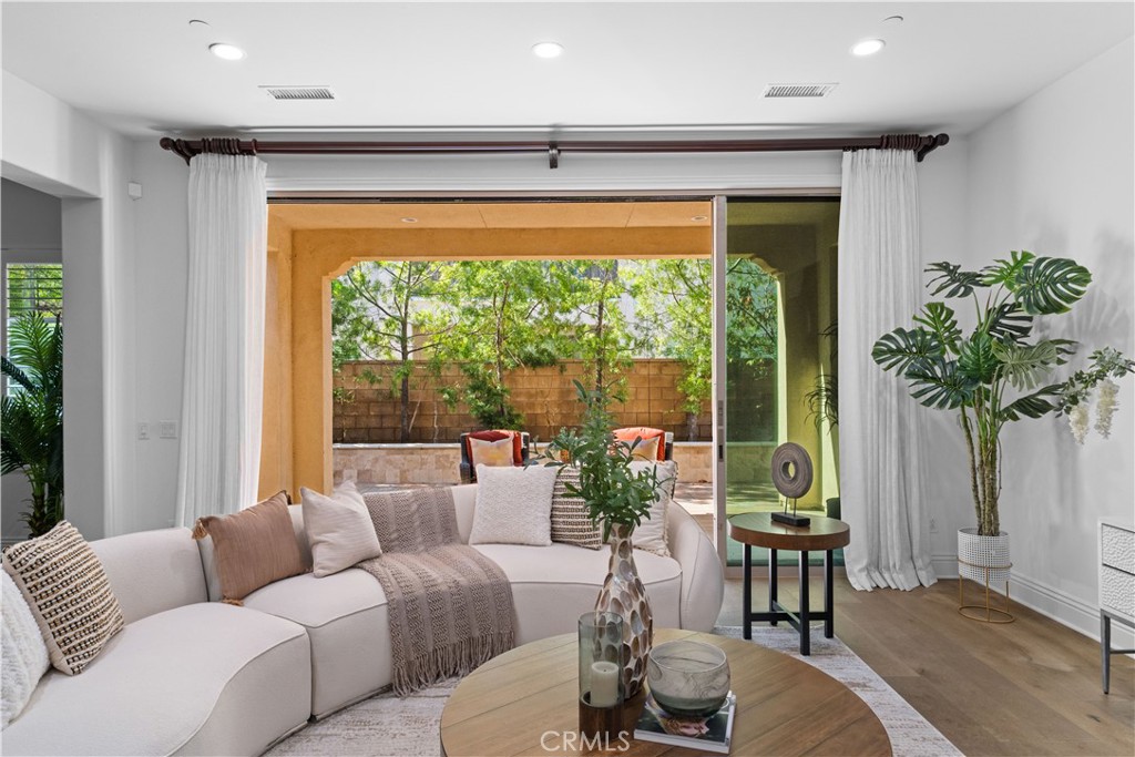 18 Windrow Road Tustin, CA 92782 - Photo 5 of 35 a living room with furniture and a large window