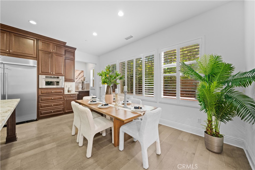18 Windrow Road Tustin, CA 92782 - Photo 10 of 35 a dining room with furniture and window