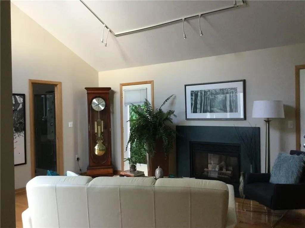 301 Stuart Way Erie, PA 16509 - Photo 15 of 50 A cozy fireplace warms the den