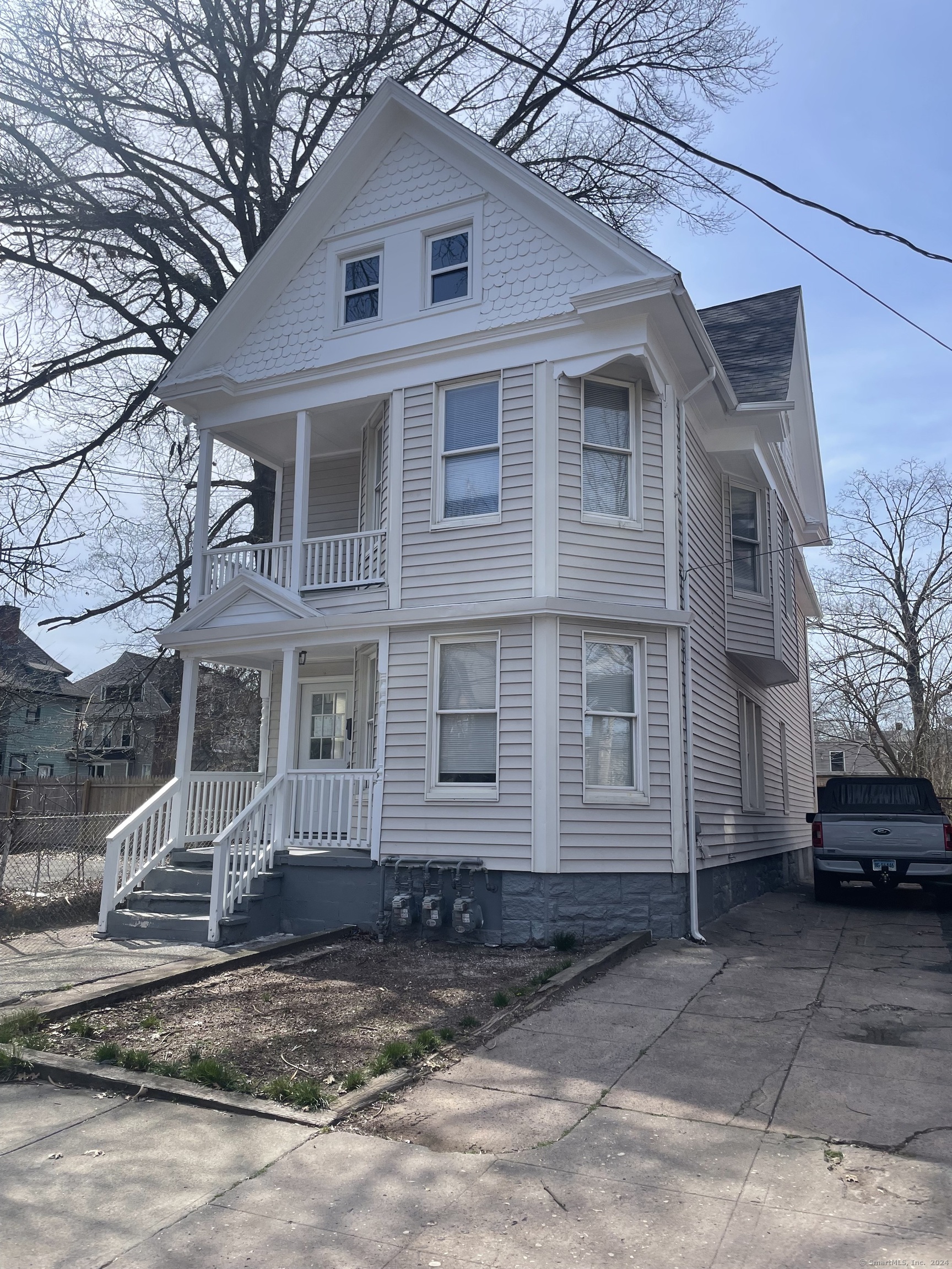 706 George Street New Haven, CT 06511 - Photo 1 of 1 a front view of a house with a yard